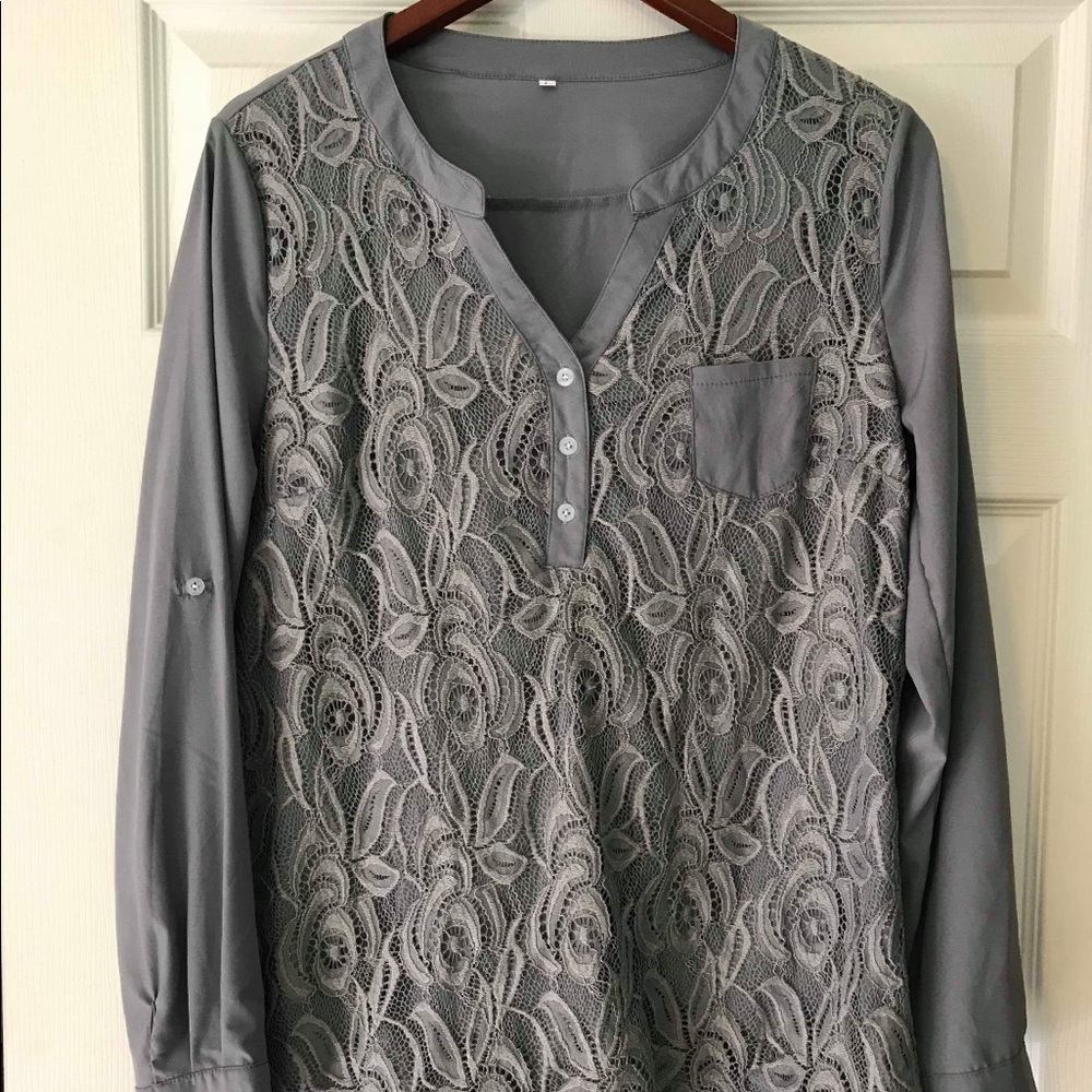Gray Blouse , size L , it has never worn.